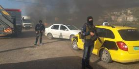 مسلحو بلاطة يغلقون شارعا في نابلس واشتباكات خفيفة مع الامن