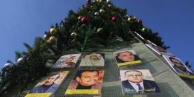 شجرة الميلاد بالعيزرية.. بصور الشهداء