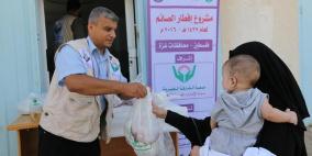 "الشارقة الخيرية بالإمارات" توزع طروداً عينية للأسر الفقيرة في فلسطين