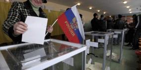 بوتين لميركل: روسيا ستحترم خيار سكان القرم