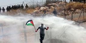 إصابة العشرات بالاختناق إثر قمع الاحتلال مسيرة بلعين السلمية