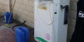 الامن الوقائي يغلق نقطة عشوائية لبيع الوقود في منطقه قلنديا