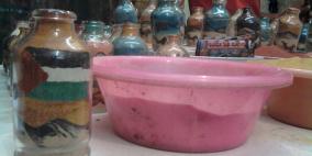 في الخليل: الرسم بالرمل الملون حرفة " أبو السعد " منذ 25 عاماً