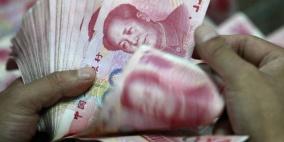 اليوان يغلق على أقل مستوى أمام الدولار في أكثر من 4 سنوات