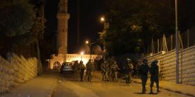 قوات الاحتلال تعتقل 14 مواطنا بينهم سيدة