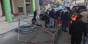 العمل تغلق منشأة في رام الله عقب وفاة عامل وإصابة آخر