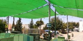 كهرباء القدس تركب مظلة قرب حاجز بيت لحم خدمة للمصلين الوافدين إلى الأقصى