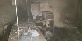 شجار بين عشرات الشبّان وإحراق محلّين تجارييْن في كفر مندا