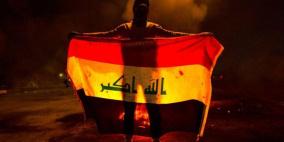 العراق: محتجون يضرمون النار في مقار فصائل شيعية في جنازة ناشط بارز