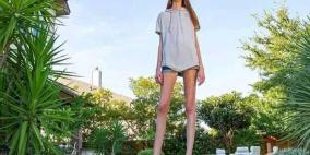 بالصور.. مراهقة تحطم رقمين قياسيين لأطول ساقين في العالم