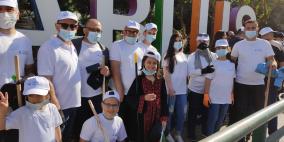 بنك الإسكان يشارك في مبادرة " نظف أمام بيتك  الوطنيه" في نابلس