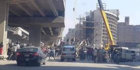 فيديو وصور.. انهيار جزئي لسقالة في جسر قيد الإنشاء بالقاهرة