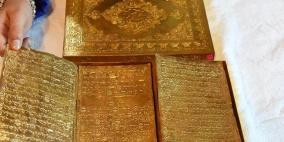 نسخة من القرآن الكريم بالذهب