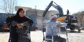 صور.. الاحتلال يجبر عائلتين على هدم منزلهما ذاتيا في القدس