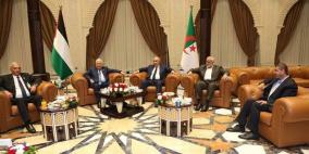 صور: لقاء يجمع الرئيس عباس وهنية مع الرئيس الجزائري