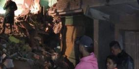 صور.. ضحايا ومفقودين بانهيار مبنى بمنطقة إمبابة في مصر