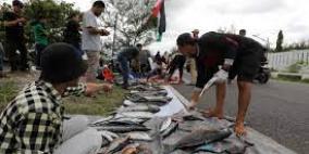 صيادون في اندونيسيا يلبون نداء دعم قطاع غزة