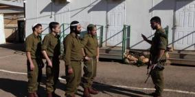 اعتقال 14 ضابطا وجنديا إسرائيليا بتهمة بيع تصاريح لعمال فلسطينيين