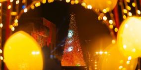 أطفال من غزة والضفة والداخل يضيئون شجرة الميلاد في روابي