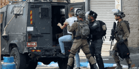 مداهمات واعتقالات بالضفة والقدس ومستوطنون يشقون طريقا استيطانيا