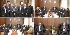 برهم يبحث مع وفد من مجلس أمناء جامعة نابلس التقنية سبل تطوير الجامعة والارتقاء بها