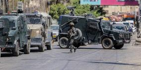 العدوان على قلنديا: 16 مصابا وهدم واعتقالات وتخريب للممتلكات