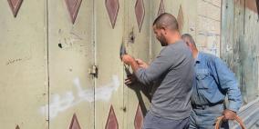 بلدية البيرة تغلق عددا من الورش الصناعية 