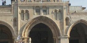 رفع العلم الفلسطيني فوق الاقصى 