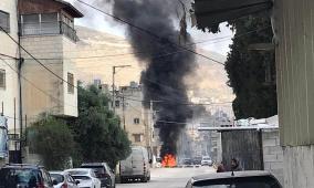 إستشهاد شاب و اصابة اخر في مخيم بلاطة و مستوطنون يضرمون النار بمنزل في قرية دوما