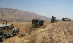 الاحتلال يشق طريقا استيطانيا على أراضي الظاهرية جنوب الخليل