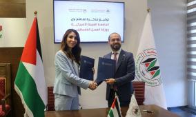 وزارة العمل والجامعة العربية الأمريكية توقعان مذكرتي تفاهم