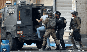 مداهمات واعتقالات بالضفة والقدس ومستوطنون يشقون طريقا استيطانيا