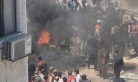 بالصور: شهداء وجرحى في قصف الاحتلال مركبة وسط مدينة غزة
