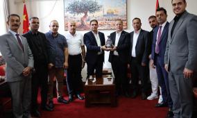السفير عواد يشيد بالدعم الصيني في تدريب الكوادر الفلسطينية بمجالات التنمية الاقتصادية والمناطق التجارية الحرة