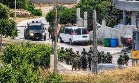 اعتقالات ومداهمات بالضفة والقدس وإصابات بالاختناق