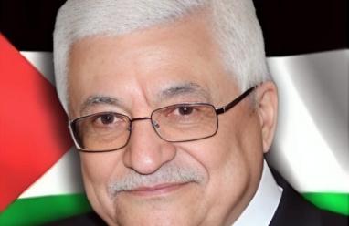 الرئي عباس يدعو "فهمي" لحث الدول العربية على الوفاء بالتزاماتها المالية