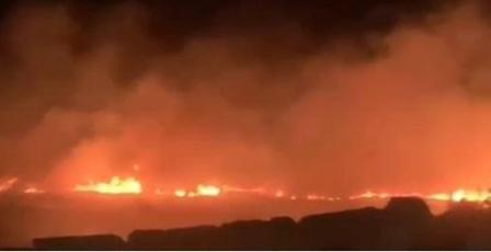 مستوطنون يحرقون أراضي زراعية في قرية المغير
