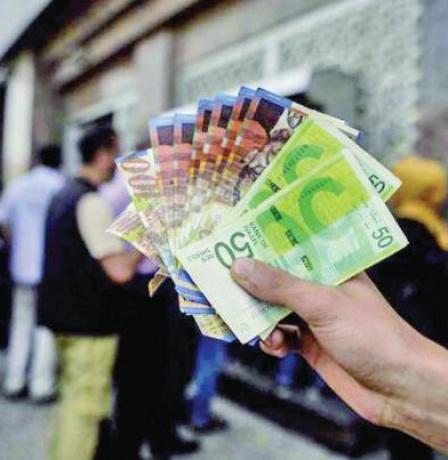 وزير المالية يعلن موعد ونسبة صرف رواتب الموظفين