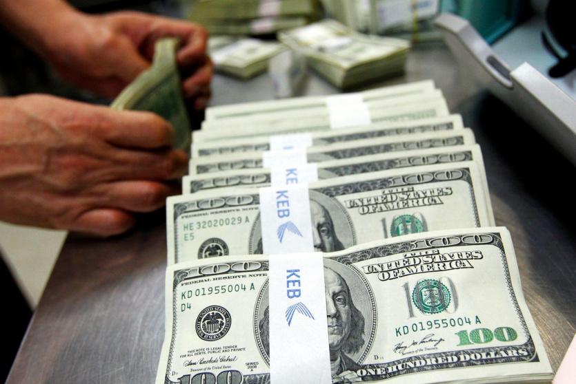 العملات - صرف الدولار مقابل الشيكل 