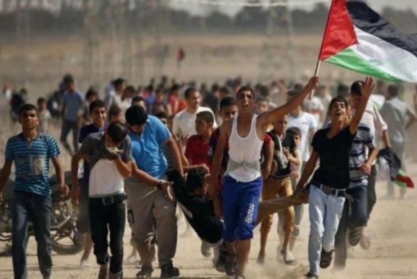 نقل مصاب في مواجهات غزة 