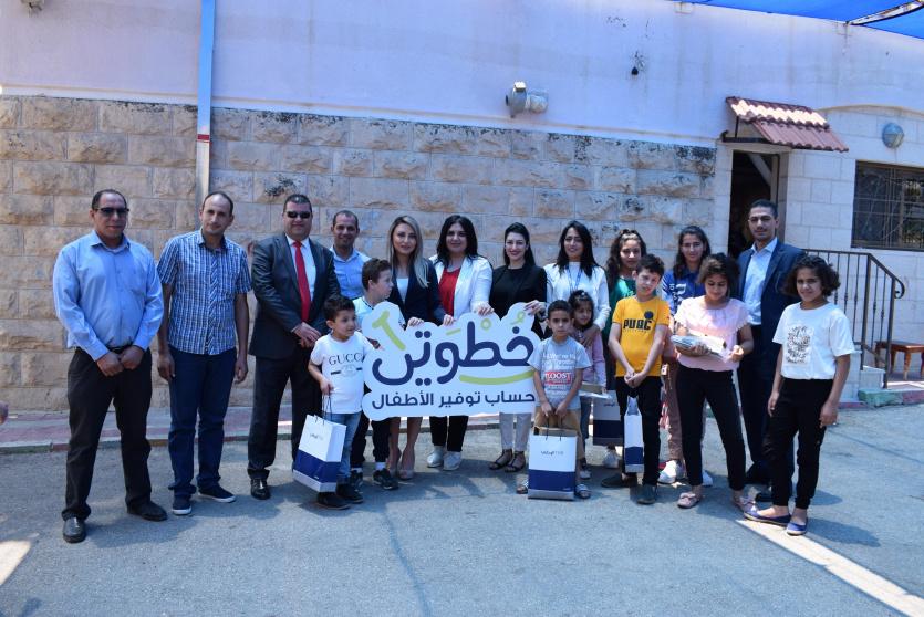 البنك الوطني يسلم الدفعة الأولى من أجهزة نت كتابي لقرى الأطفال  SOS فلسطين