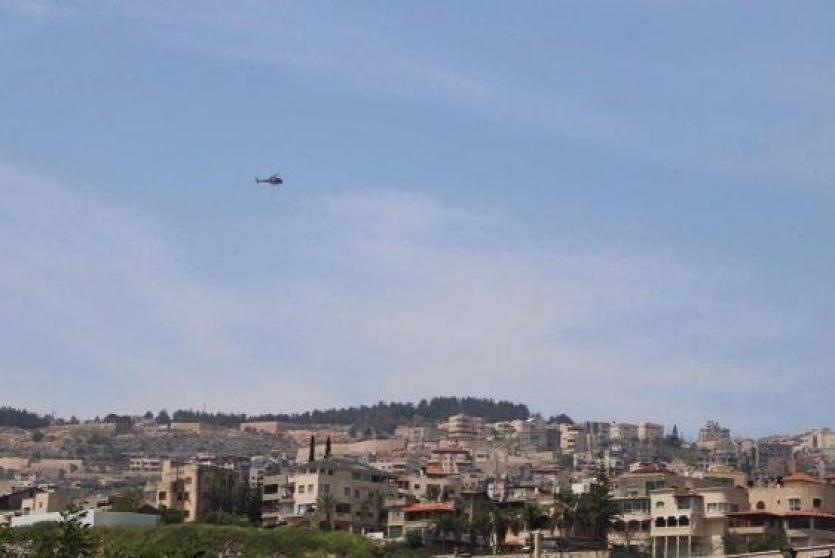 مروحية لمراقبة الأوضاع في دير الأسد