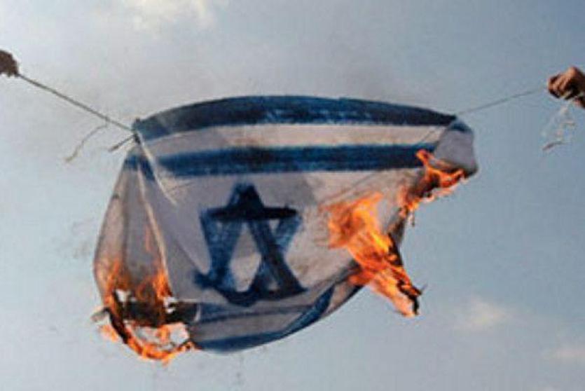 المانيا تشرع قانونا بالسجن الفعلي لكل من يحرق العلم الاسرائيلي