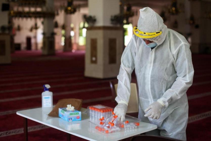 عينات فحص كورونا في غزة 