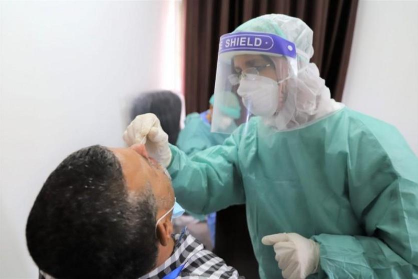 اخذ فحص لكورونا 