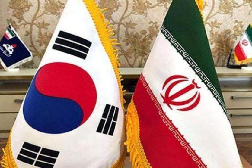 العلم الإيراني والكوري الجنوبي