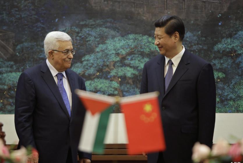 لقاء سابق بين الرئيس عباس ونظيره الصيني 
