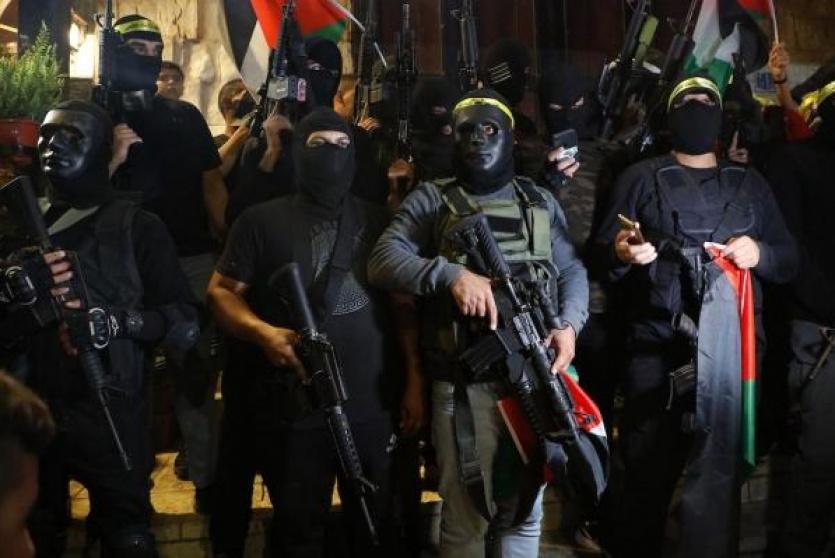 مسلحون فلسطينيون في مسيرة دعما للأسرى - ارشيف