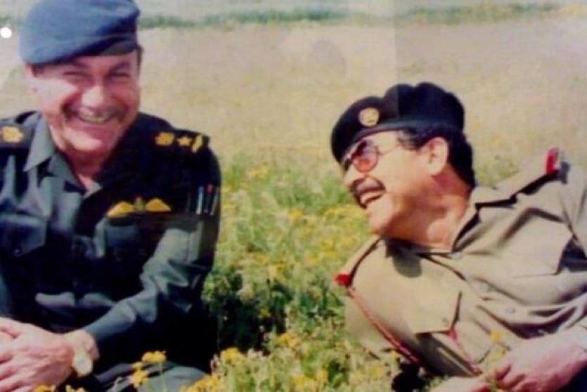 صدام حسين ومرافقه