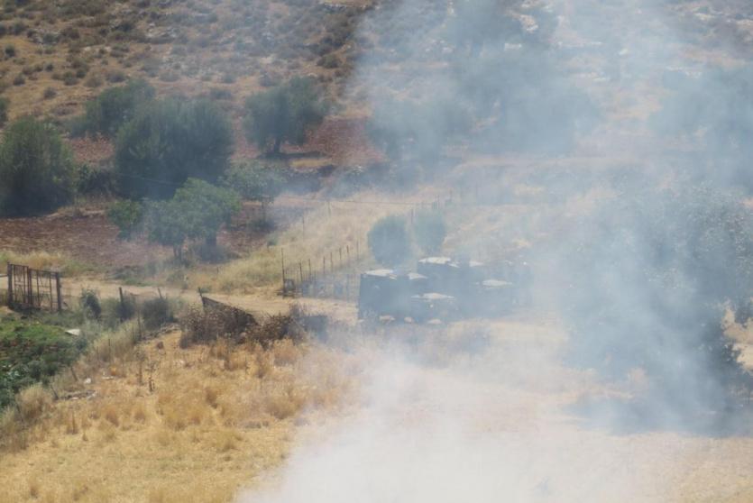 إحراق أراض خلال مواجهات مع الاحتلال في قريوت